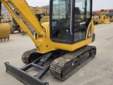 2022 Komatsu PC56 mini excavator, front three-quarter view