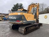 2010 Hyundai R140LC-9 crawler excavator, rear three-quarter view