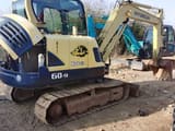 2023 Hyundai R60-9 mini excavator, rear three-quarter view