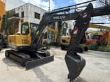 2023 Volvo EC55B mini excavator, front three-quarter view