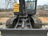 2023 Volvo EC60C mini excavator front view with blade