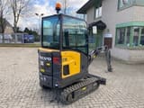 2022 Volvo EC18E mini excavator, rear three-quarter view