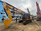 Escavatore cingolato Caterpillar 320DL del 2022, vista laterale