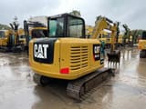 2019 Caterpillar 305.5E mini excavator, rear three-quarter view