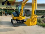 2023 Komatsu PC55 mini excavator, front three-quarter view