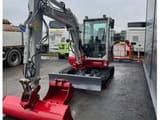 2021 Takeuchi TB240 crawler excavator, front three-quarter view