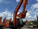 Hitachi ZX200-5G crawler excavator, front three-quarter view
