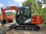 2024 Hitachi ZX60 mini excavator, side view