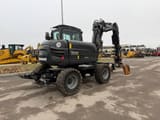 2023 Yanmar B95W excavator, rear three-quarter view