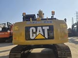 2022 Caterpillar 323DL crawler excavator, rear view