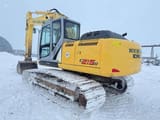 2011 New Holland E215B LC crawler excavator, rear three-quarter view