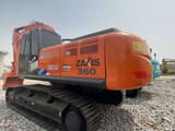 2024 Hitachi Zaxis 360 crawler excavator, rear three-quarter view