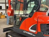 2020 Doosan DX60-9C mini excavator, side view of cab and boom