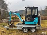 2018 Airman AX19-6A mini excavator, side view on trailer