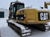 Escavatore cingolato Caterpillar 320D L del 2010, vista posteriore tre quarti