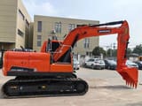 2022 Doosan DX150-9C mini excavator, side profile view