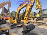 2024 Caterpillar 305.5E2 mini excavator, side profile view