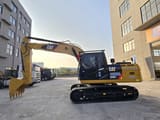 2022 Caterpillar 320DL Raupenbagger, Seitenansicht