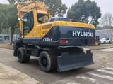 2024 Hyundai R210W-9 wheel excavator rear three-quarter view