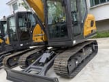 2026 XCMG XE75GA mini excavator, front three-quarter view