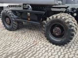 2020 Caterpillar M320F wheel excavator undercarriage view