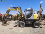 2014 Wacker Neuson EW100 wheel excavator side view