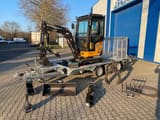 Berger Kraus BK2000NKSR mini excavator on trailer with attachments