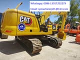 2023 Caterpillar 320GC crawler excavator, rear three-quarter view