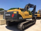 Volvo EC210BLC crawler excavator, rear three-quarter view