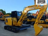 2022 Komatsu PC56 mini excavator, three-quarter view