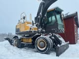 2014 Volvo EW160D wheel excavator, side profile view
