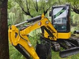 2023 Caterpillar 303.5 mini excavator, side view