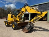 2013 Komatsu PW98MR-8 wheel excavator, side view