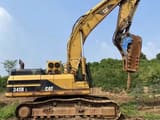 2006 Caterpillar 345B L crawler excavator side view with hydraulic hammer