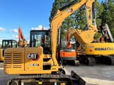 2022 Caterpillar 305.5E2 mini excavator, side view