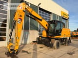 2020 Caterpillar MH3022-06C material handler, side view