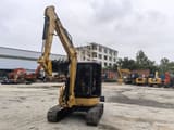 2023 Caterpillar 303.5E mini excavator, front three-quarter view