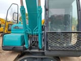 Kobelco SK140-8 crawler excavator, rear-side view