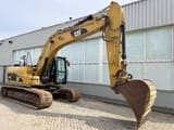 2012 Caterpillar 319D crawler excavator side view