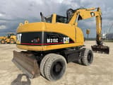 2006 Caterpillar M315C wheel excavator, rear three-quarter view