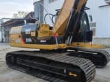 2016 Caterpillar 320DL crawler excavator, side view