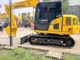 2023 Komatsu PC70-8 crawler excavator, side profile view