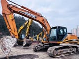Case CX240B crawler excavator, side view