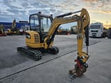 2015 Caterpillar 302.7DCR mini excavator, side view