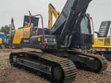 Volvo EC240 crawler excavator, rear three-quarter view