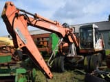 1996 Atlas 1404 M wheel excavator, front three-quarter view