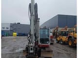 2018 Takeuchi TB290 mini excavator, front view with boom raised