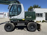 2009 New Holland MH-PLUS wheel excavator, side view