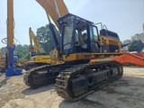 2019 Caterpillar 374DL crawler excavator, front three-quarter view