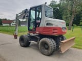 2013 Takeuchi TB295W wheel excavator, rear three-quarter view